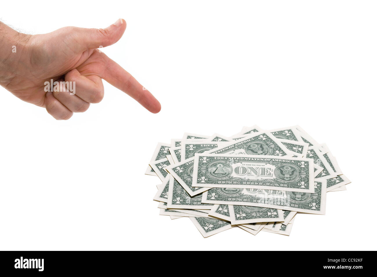 hand points at one dollar bills Stock Photo