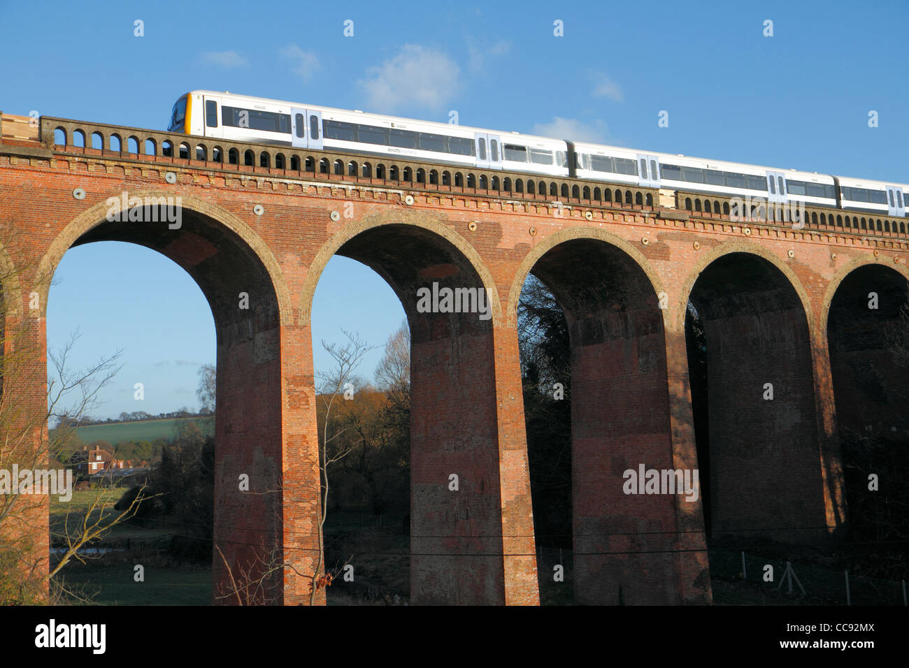 Train passing over Eynsford viaduct, Kent UK Stock Photo