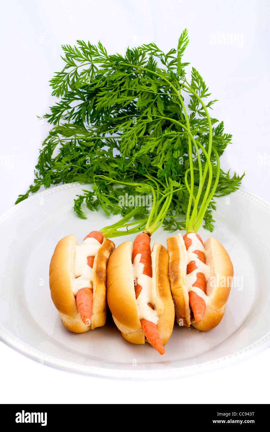 Carrots in a Hot dog dun with ranch dressing make a healthy lunch Stock