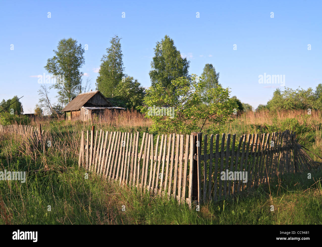 old wooden fence near farmhouse Stock Photo - Alamy