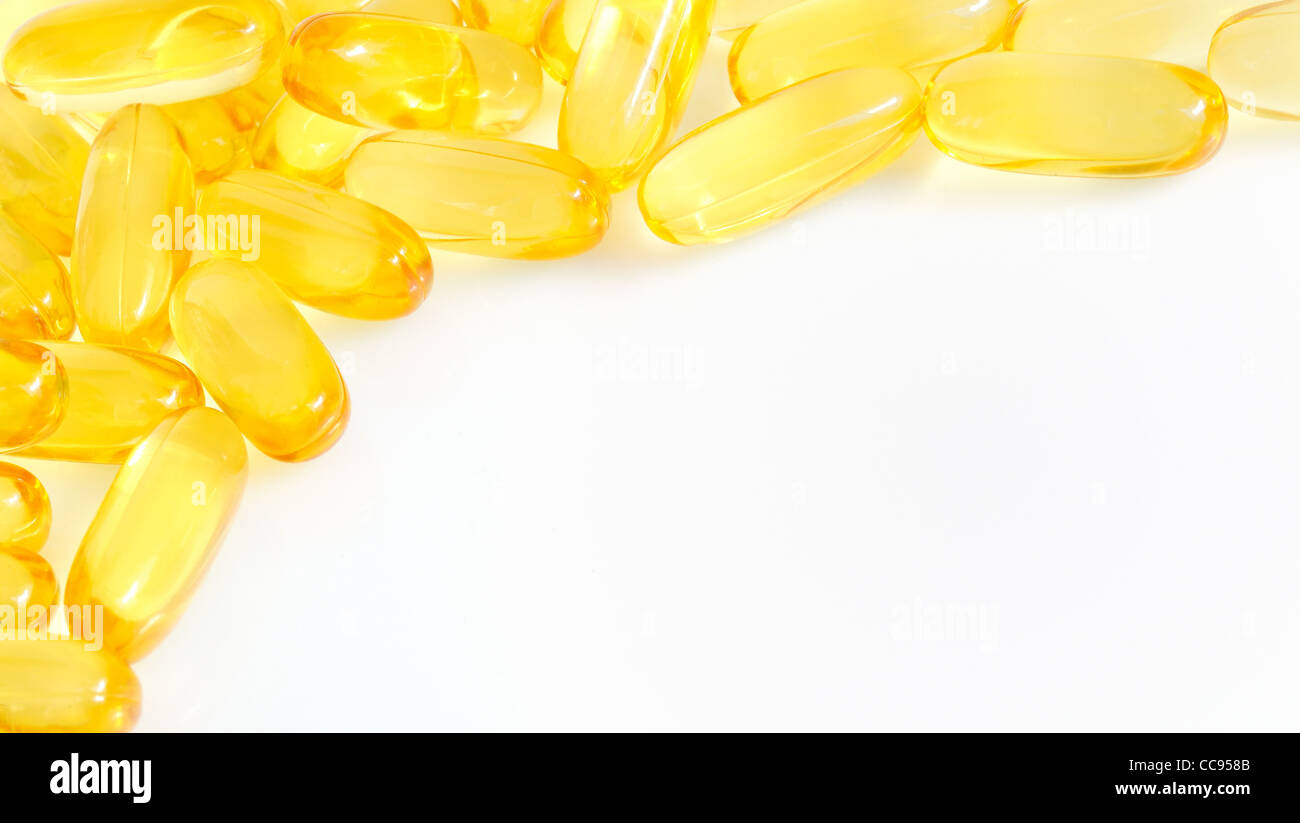 yellow fish oil capsule Stock Photo