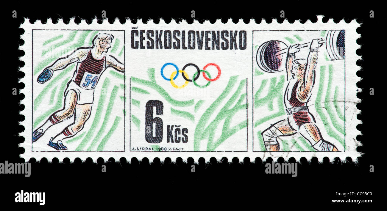 Postage stamp from Czechoslovakia depicting weight lifting and discus