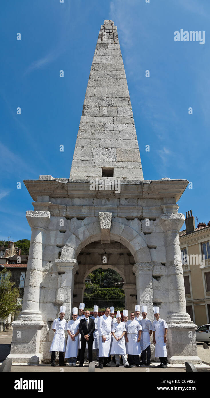 All the kitchen brigade under the Vienne's roman Pyramid. Vienne, Isere, France., Located on the main axe north/south, at 30 Km Stock Photo