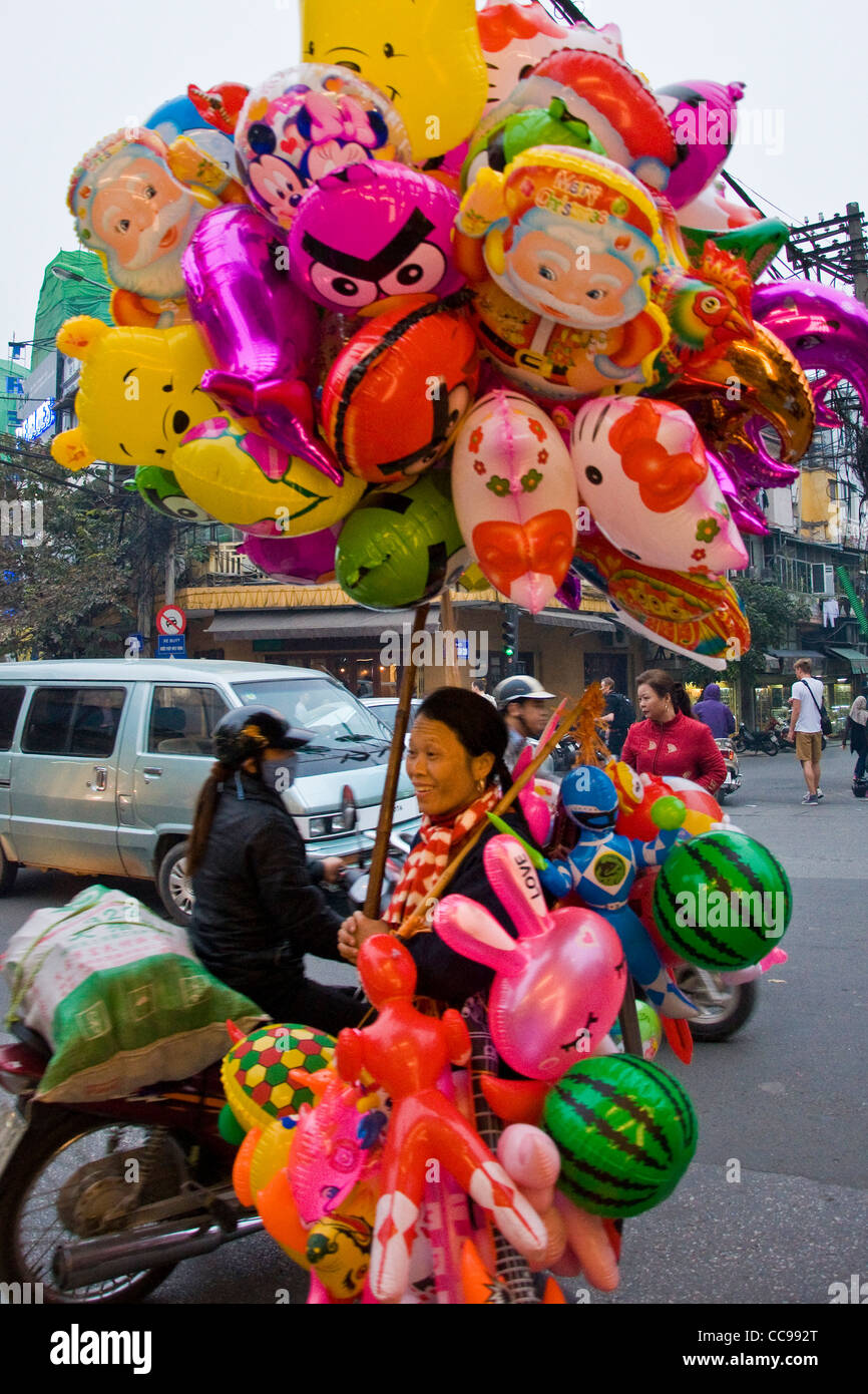 Balloons peddler, Hanoi, Vietnam Stock Photo Alamy