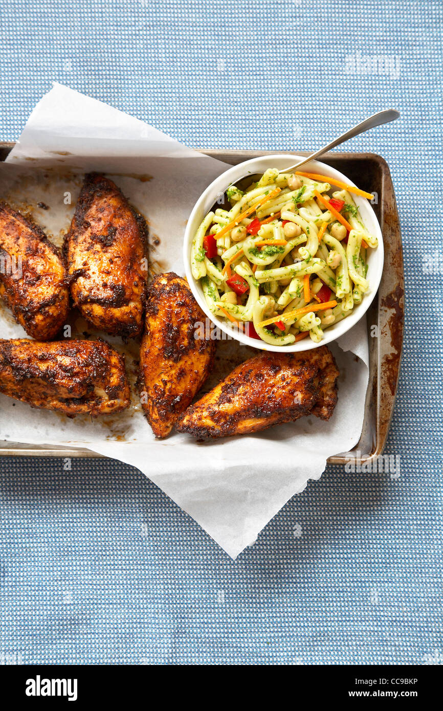 Spiced Rubbed Barbeque Chicken and Pasta Salad Stock Photo