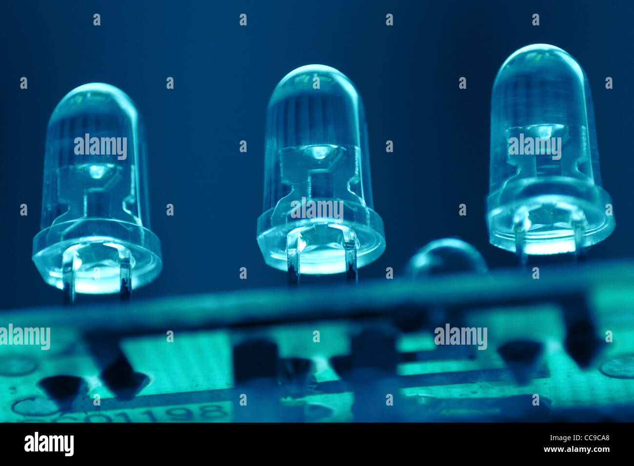 Three LED (light-emitting diode) on the circuit board; focus on diodes Stock Photo
