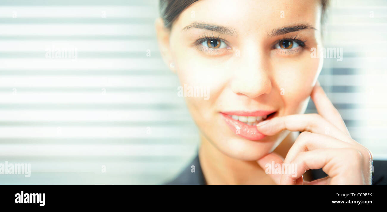 Closeup portrait of cute young business woman smiling Stock Photo - Alamy