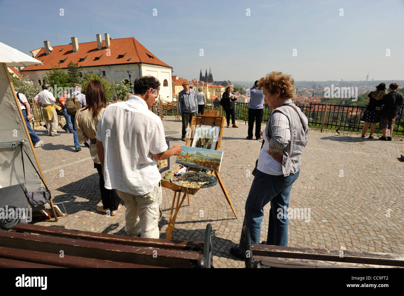 Street artist painting tourist paintings at Prague Castle Prague Czech Republic Stock Photo