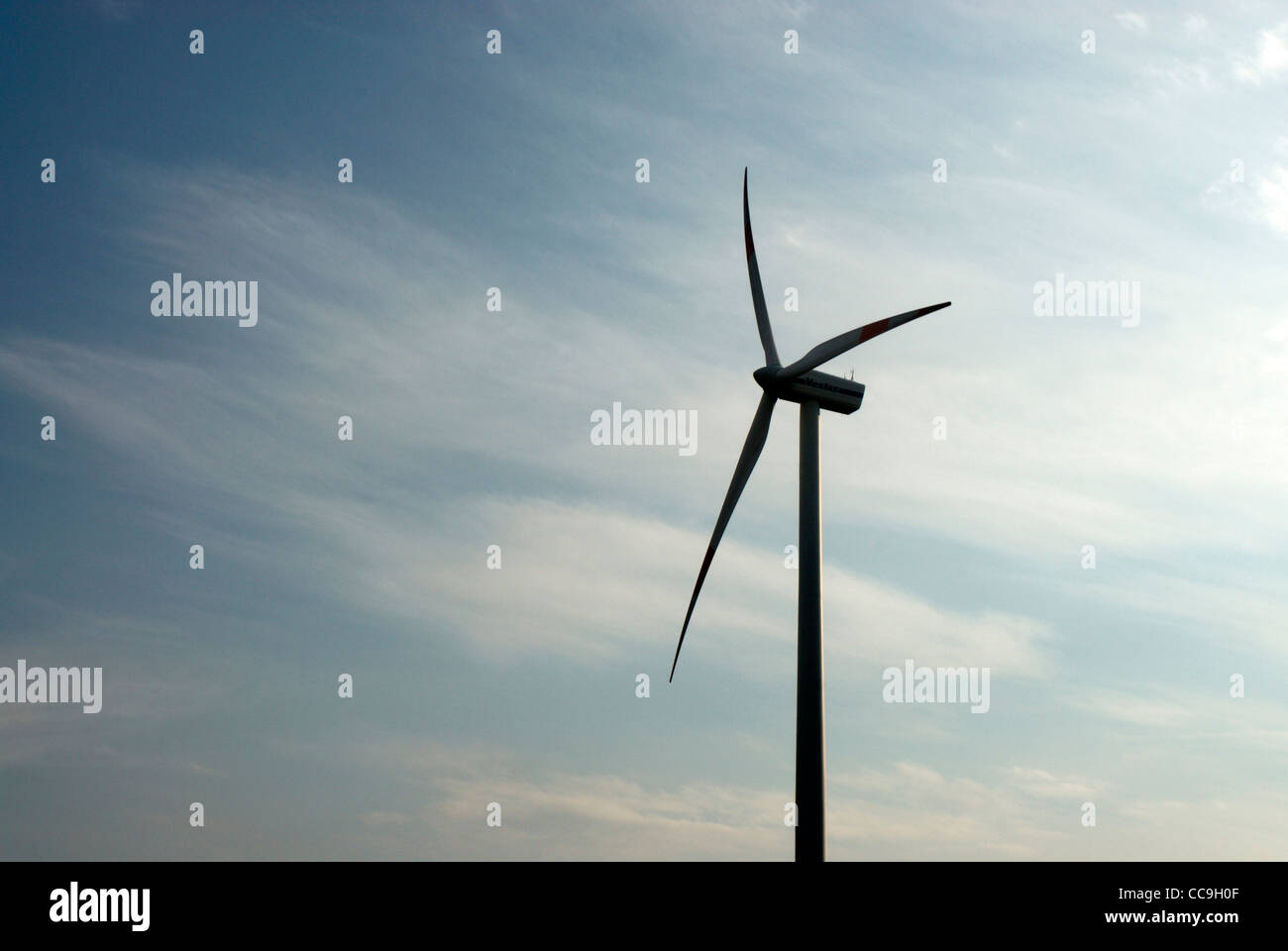 Outdoors Wind Turbine Sustainable Resources silhouette austria rebnewable energy silhouette looking up blue sky Stock Photo