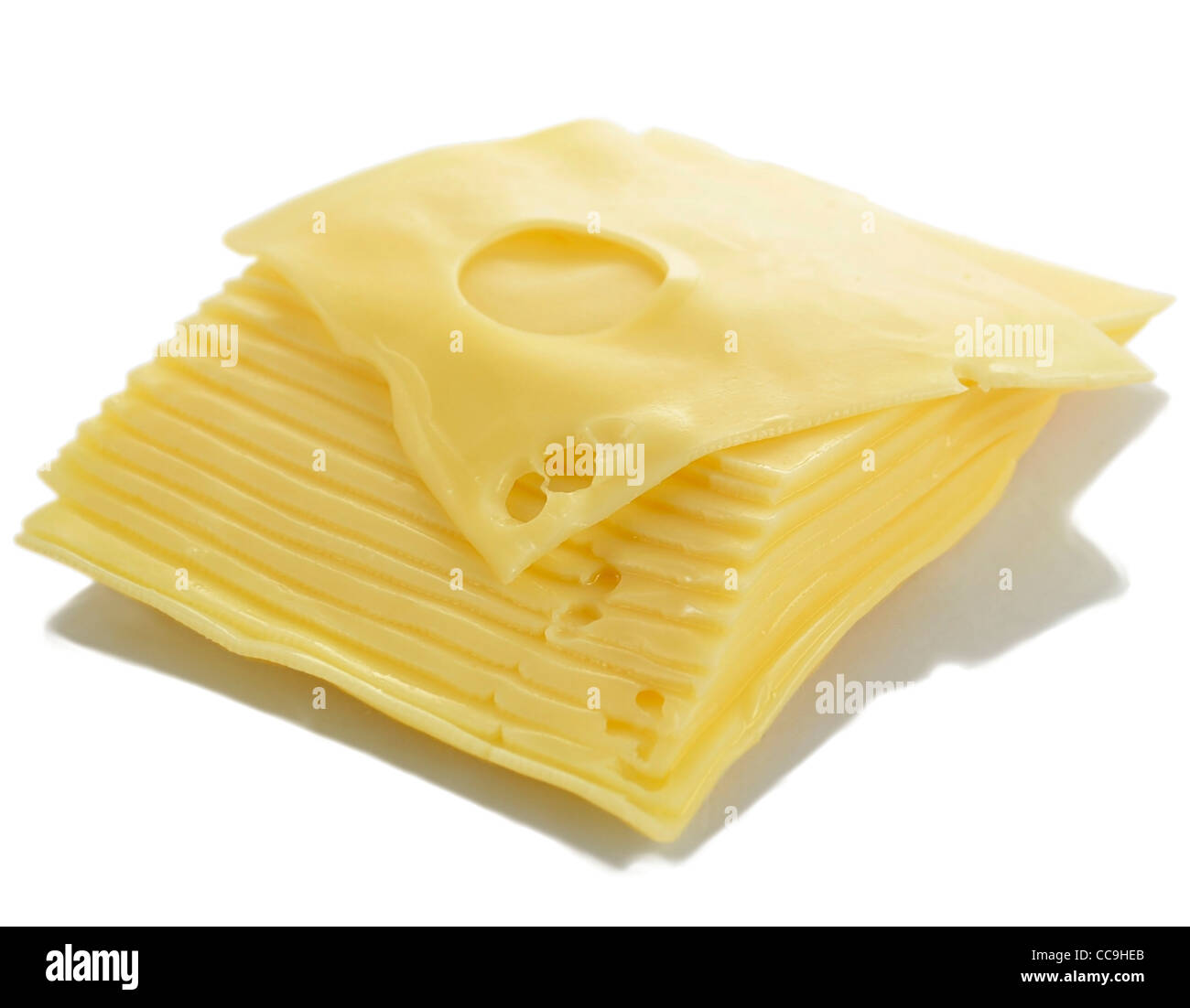 swiss cheese slices on white background Stock Photo