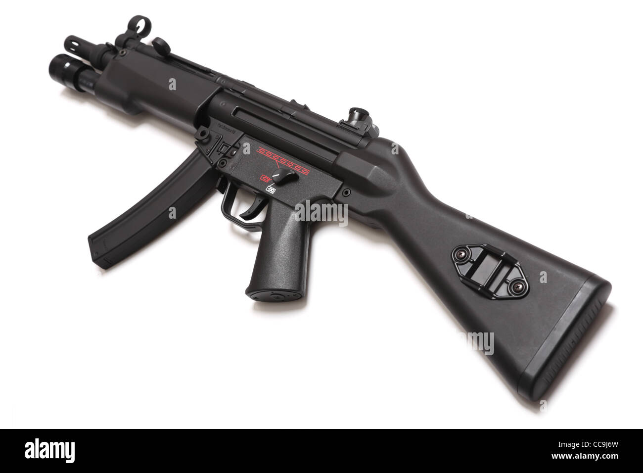 HK MP5 - legendary submachine gun with tactical flashligt. Tilt view. Isolated on a white background. Weapon series. Stock Photo