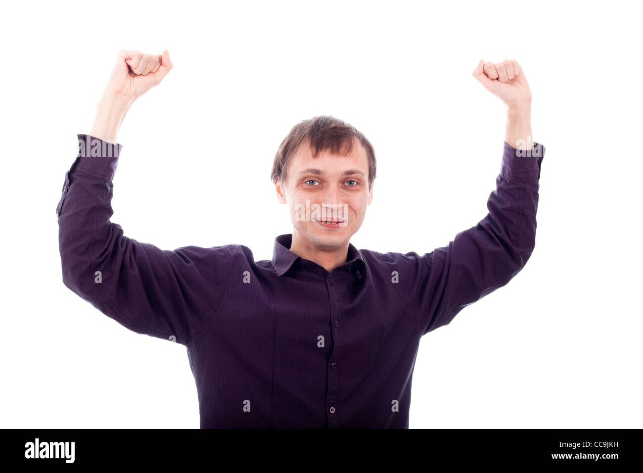Happy nerd with hands up, isolated on white background. Stock Photo