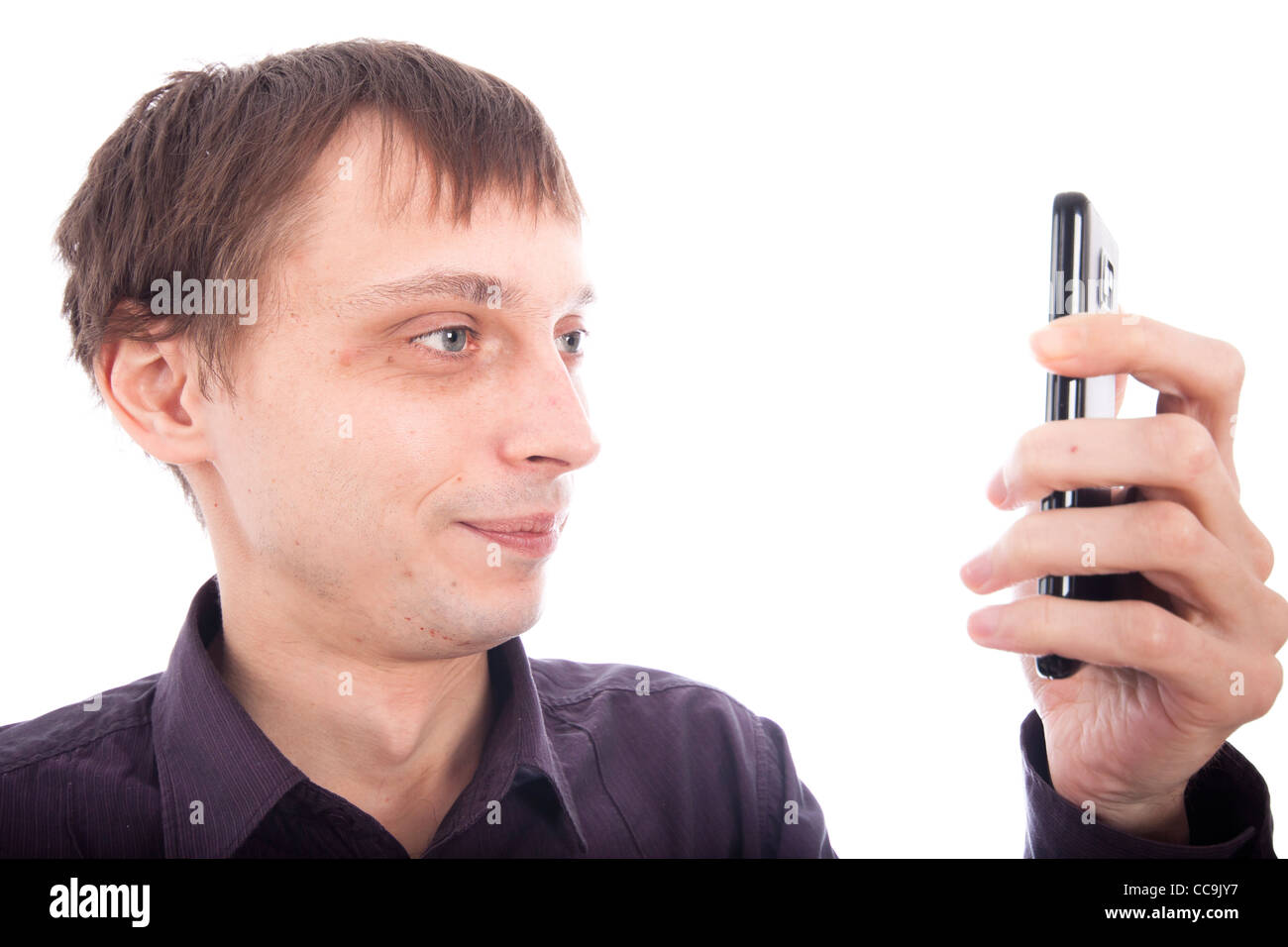 Weirdo man looking at cellphone, isolated on white background. Stock Photo