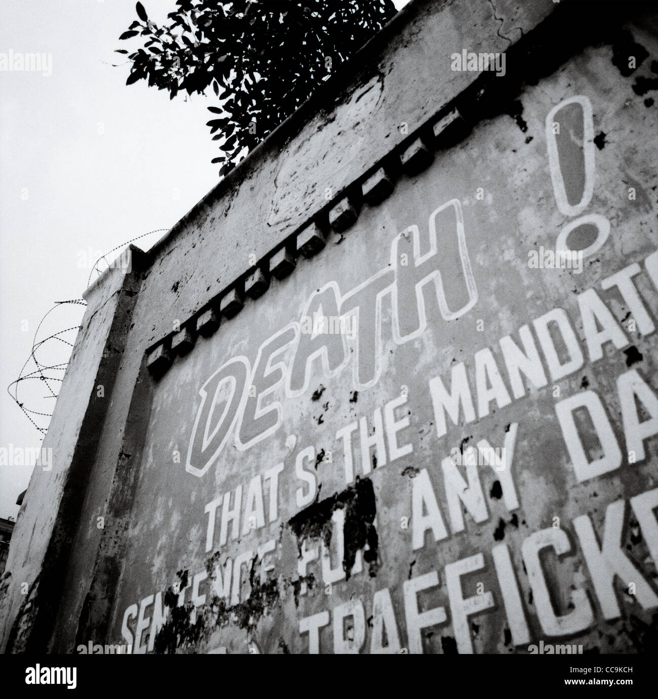 A warning of the death penalty for drug trafficking on the wall of Pudu Prison in Kuala Lumpur in Malaysia in Far East Southeast Asia. Narcotics Art Stock Photo