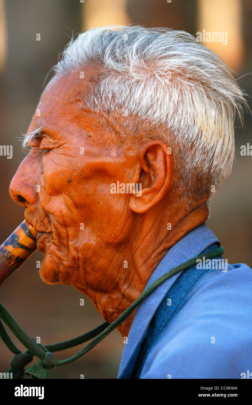 Flutist in a temple III. Si Satchanalai historical park, Thailand Stock