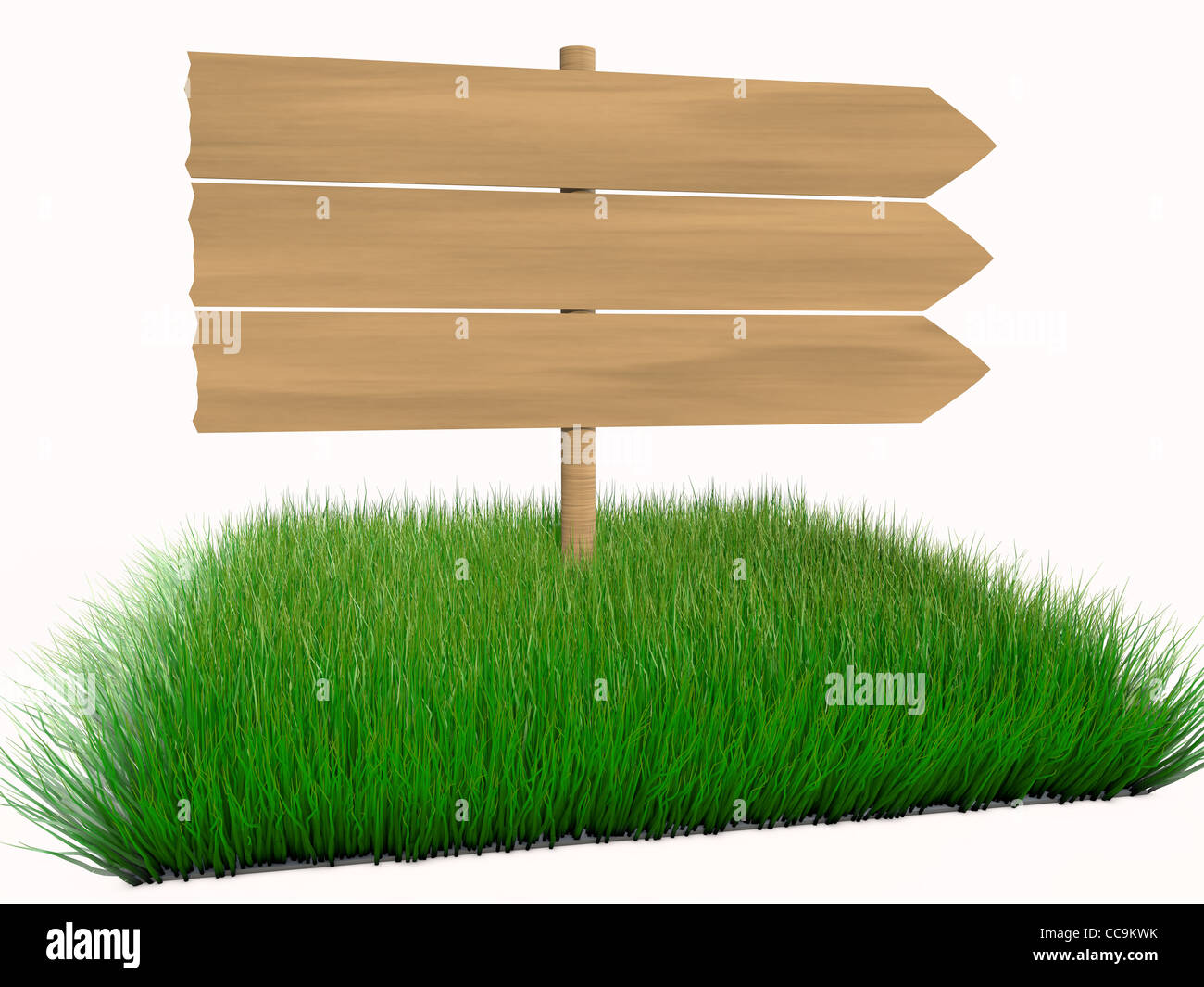 Wooden Sign in the middle of green Grass Stock Photo - Alamy