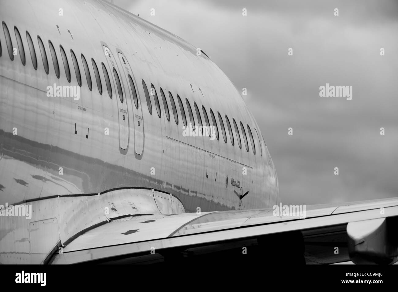 Airliner jet  windows in black and white Stock Photo