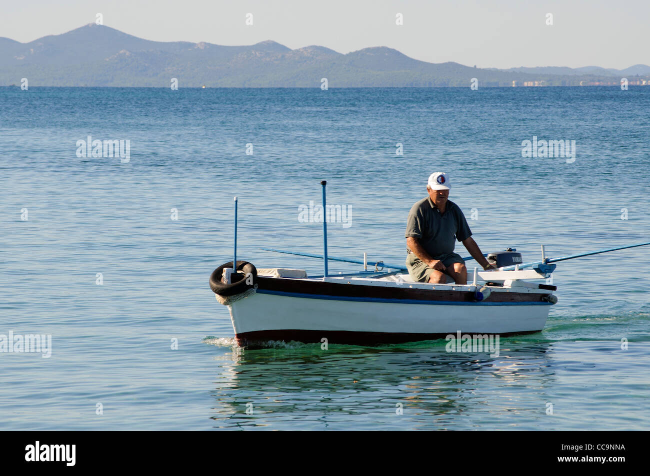 Old man in boat hi-res stock photography and images - Alamy