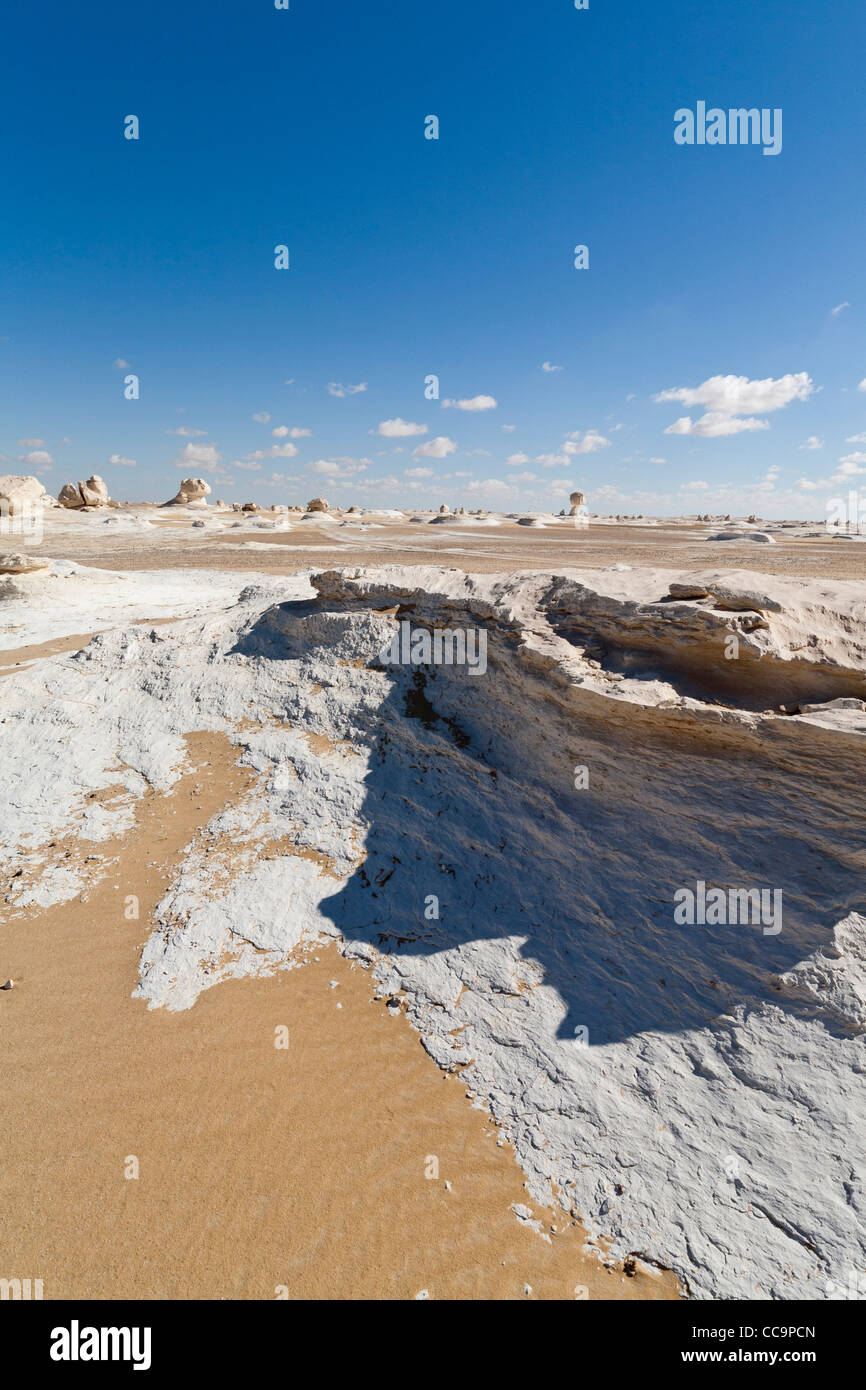 Vertical shot of Inselbergs with surrounding ridged sand in the White Desert, close to Farafra