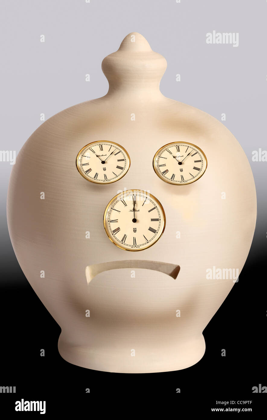 Intended as a slightly humorus look at poor savings rates, this image shows a sad face made from clock faces to indicate time running out for saving Stock Photo
