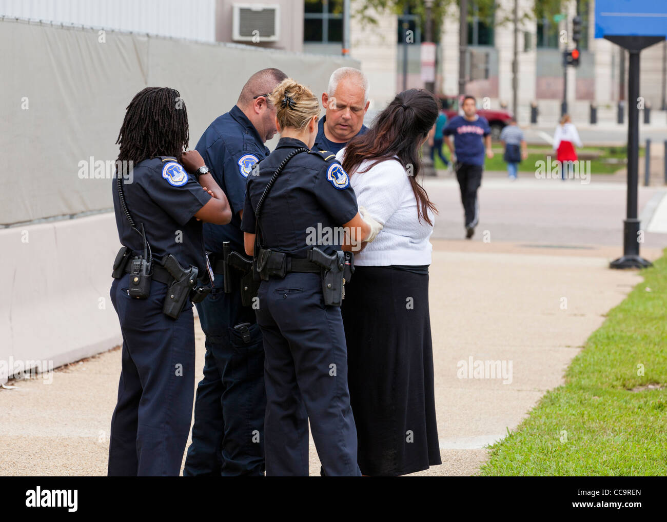 US Capitol Police handcuffing a woman - Washington, DC USA Stock Photo