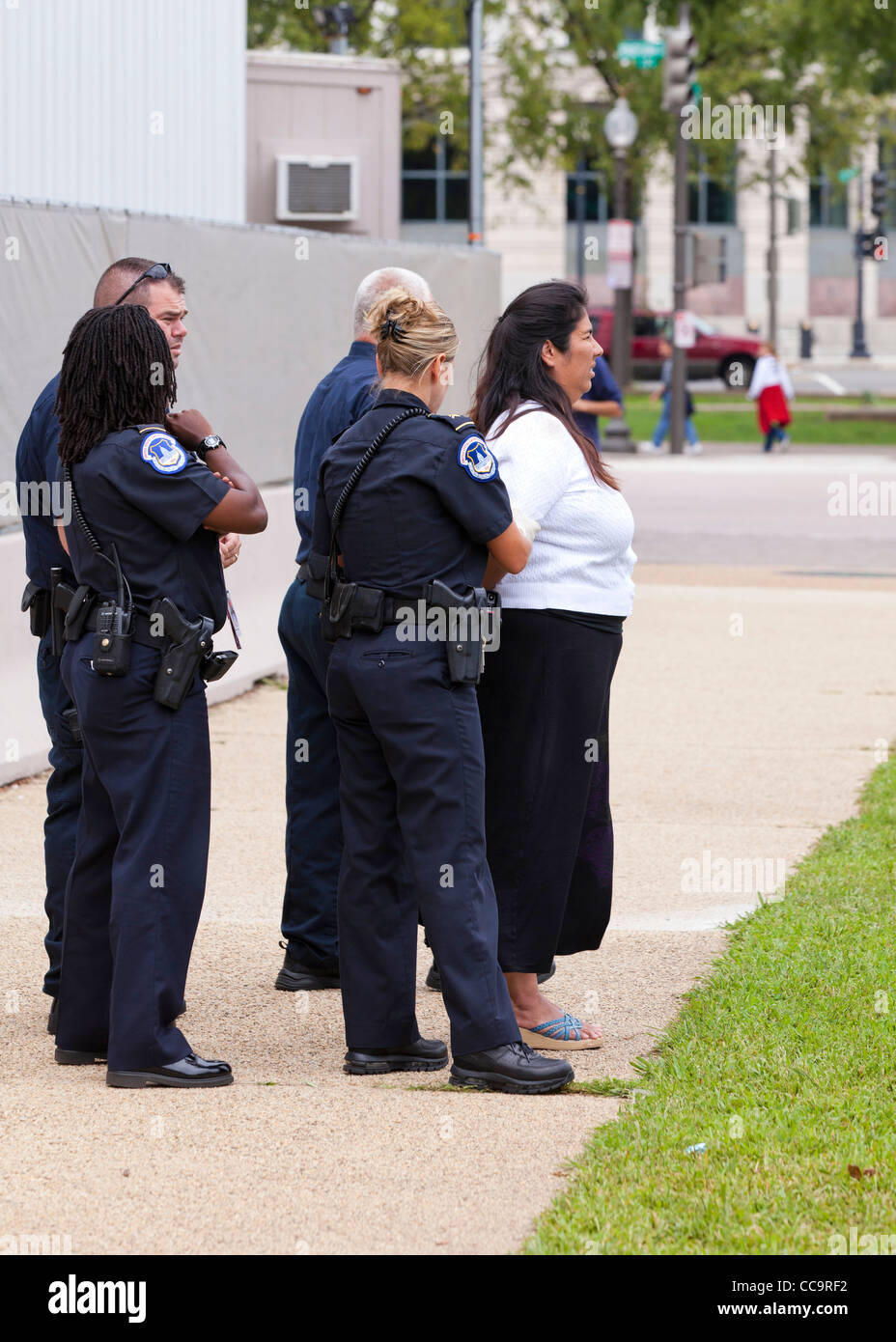 US Capitol Police handcuffing a woman - Washington, DC USA Stock Photo