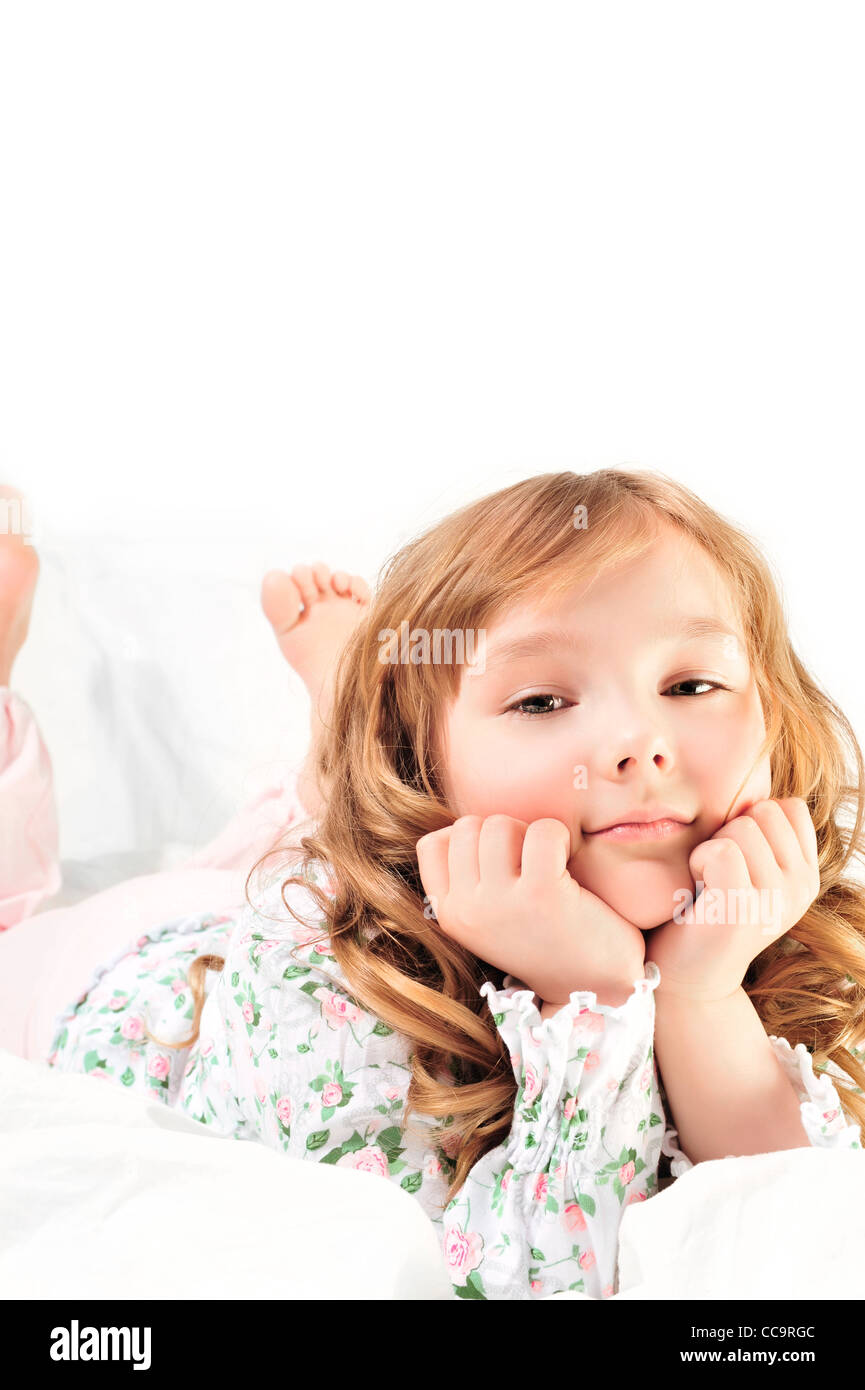 Closeup Portrait of adorable little girl with beautiful long curly hair ...