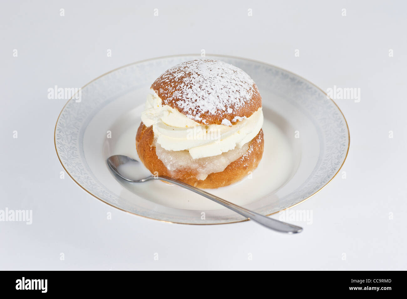 Cream bun with almond paste and hot milk Stock Photo