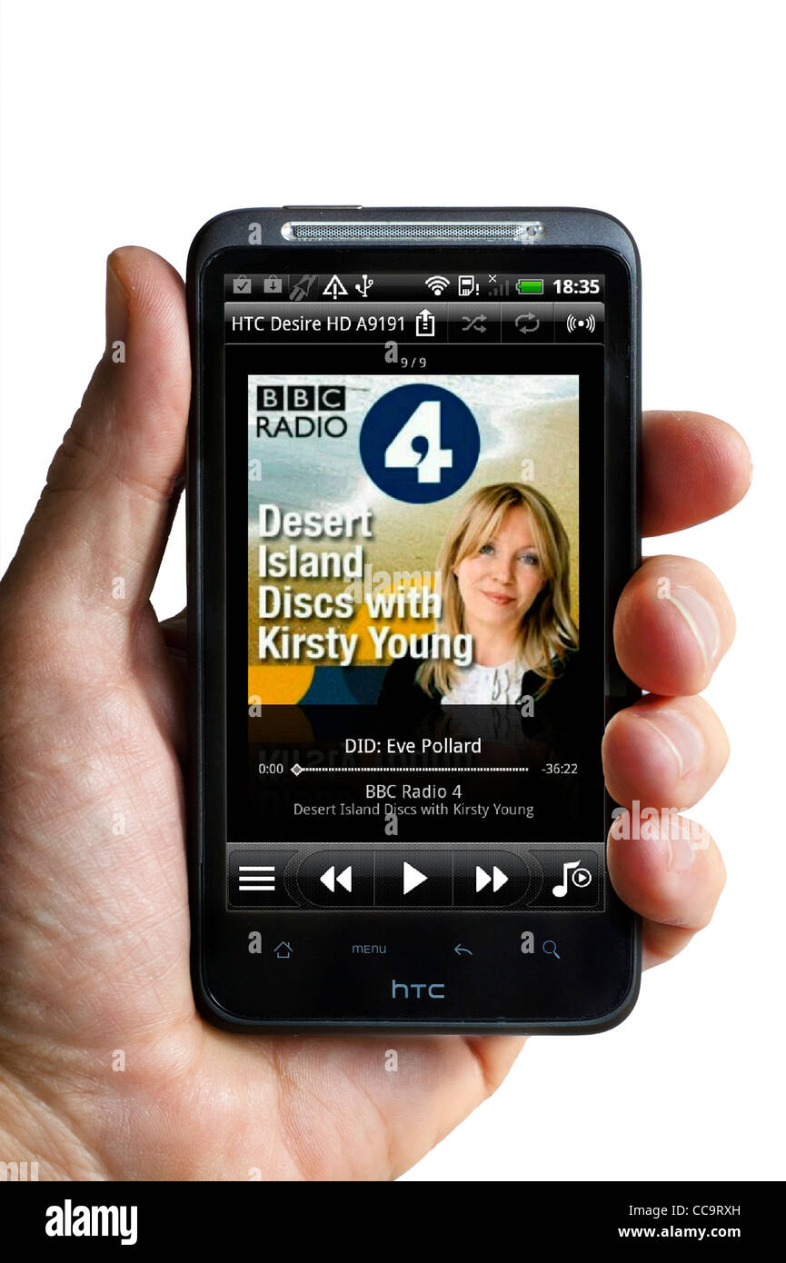 Playing a BBC Radio 4 podcast of Desert Island Discs on the MP3 player on an android HTC smartphone Stock Photo