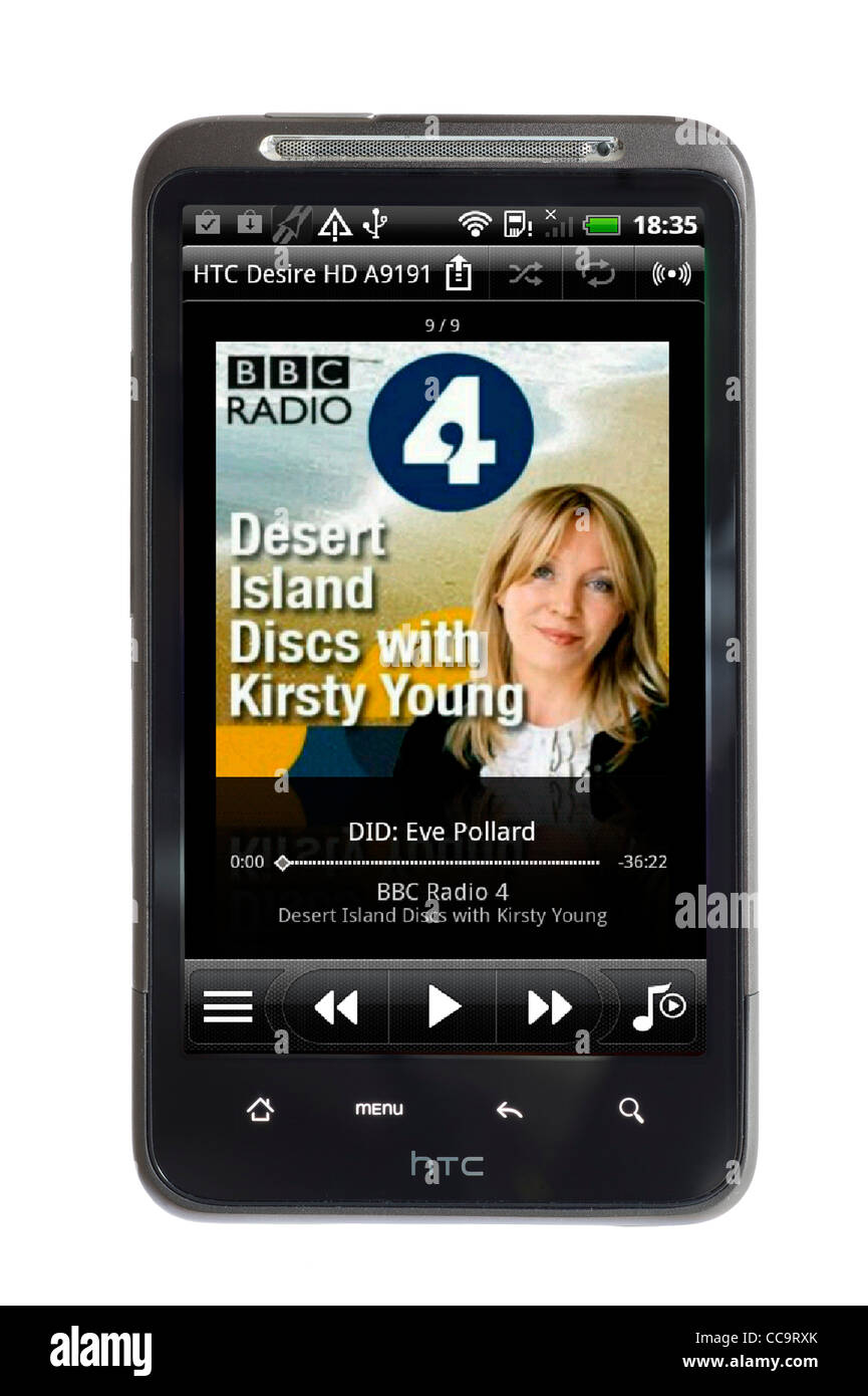 Playing a BBC Radio 4 podcast of Desert Island Discs on the MP3 player on an android HTC smartphone Stock Photo