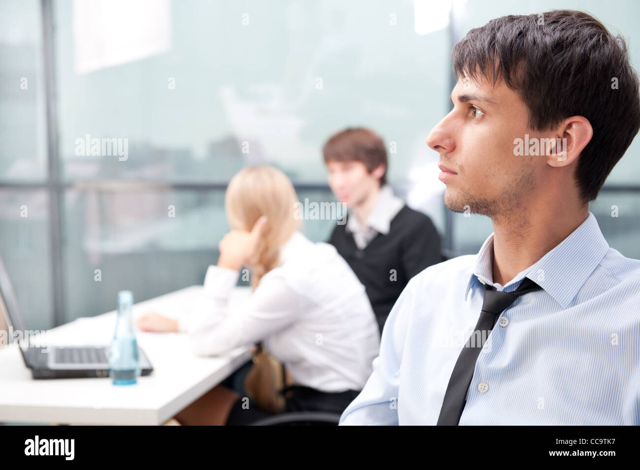 Closeup Portrait of a smart young businessman smiling and his ...