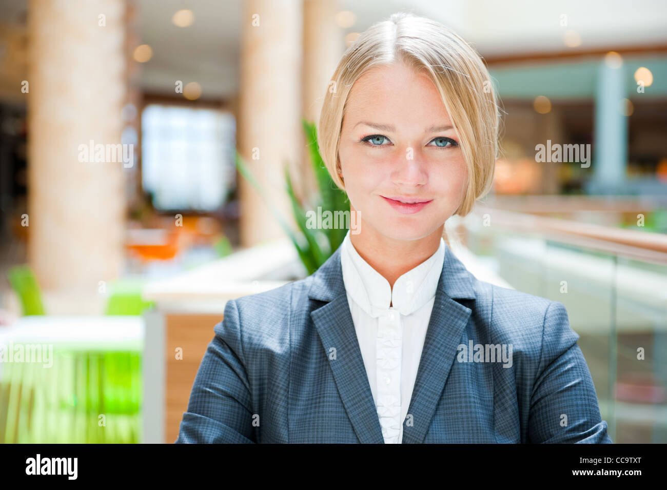 Closeup Portrait of cute young business woman smiling Stock Photo - Alamy