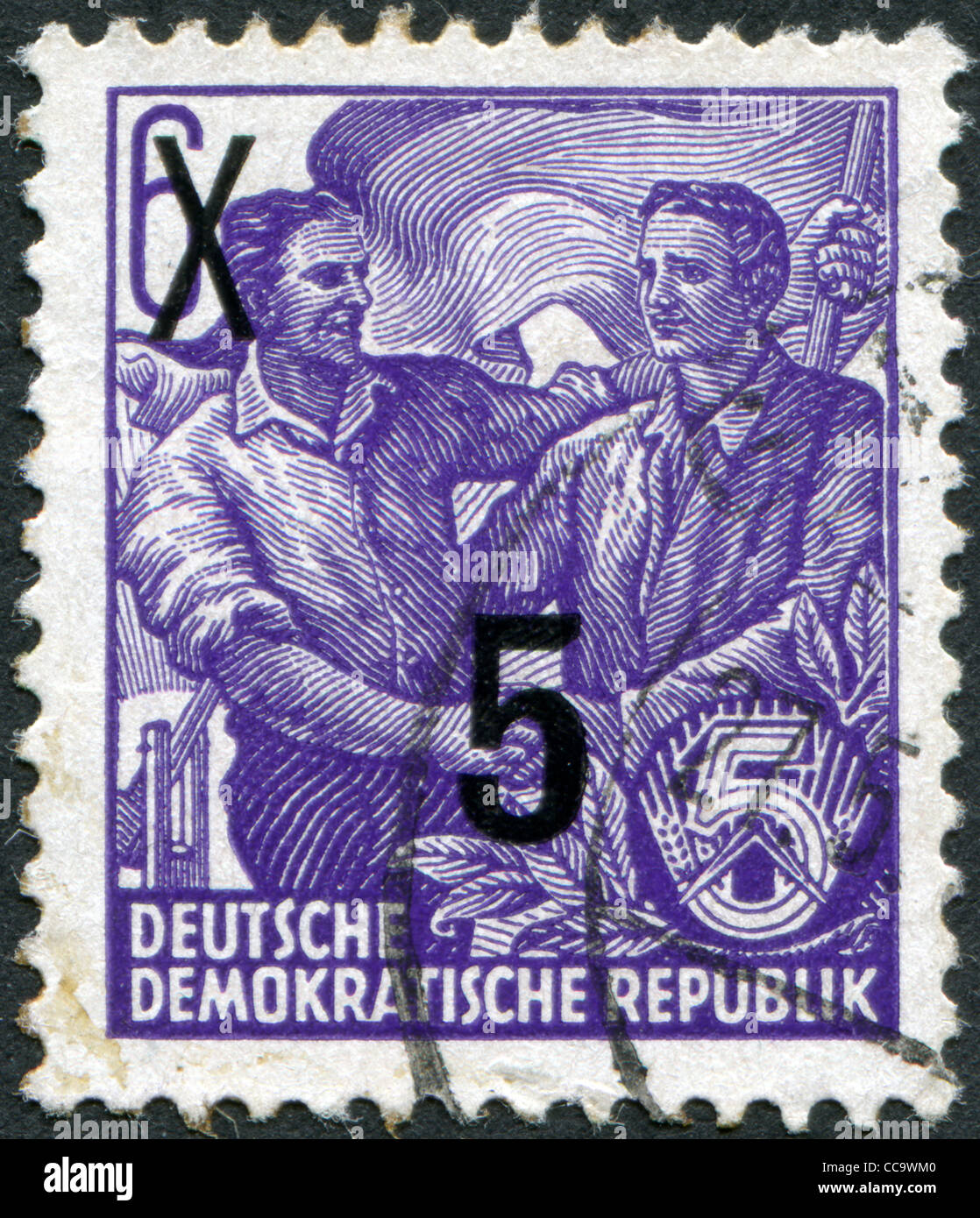DDR - CIRCA 1953: A stamp printed in DDR, shows the German and Soviet workers shake hands (overprint 1954), circa 1953 Stock Photo