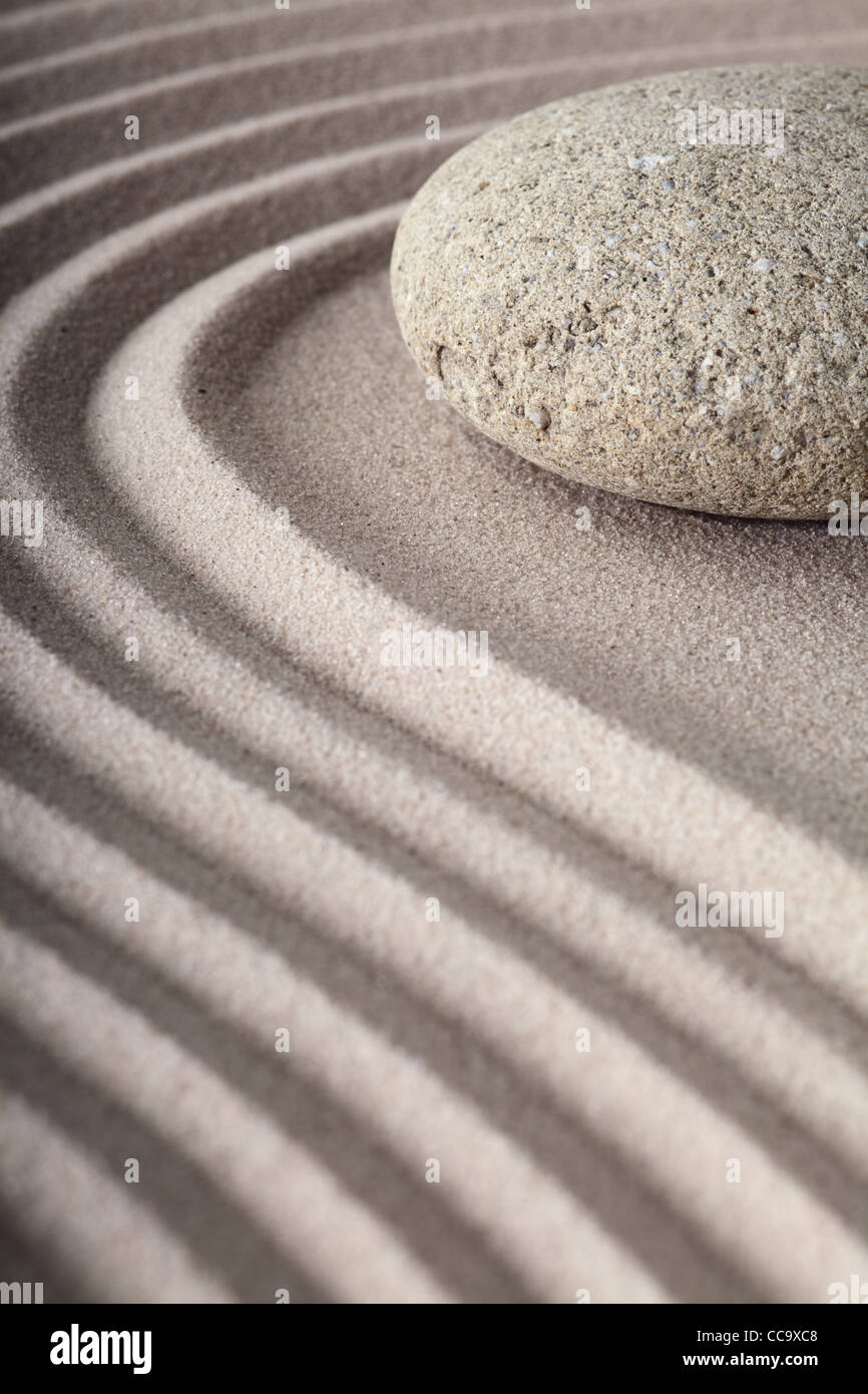 Japanes meditation spa garden pattern of sand and stones with curved lines for balance and relaxation zen buddhism Stock Photo