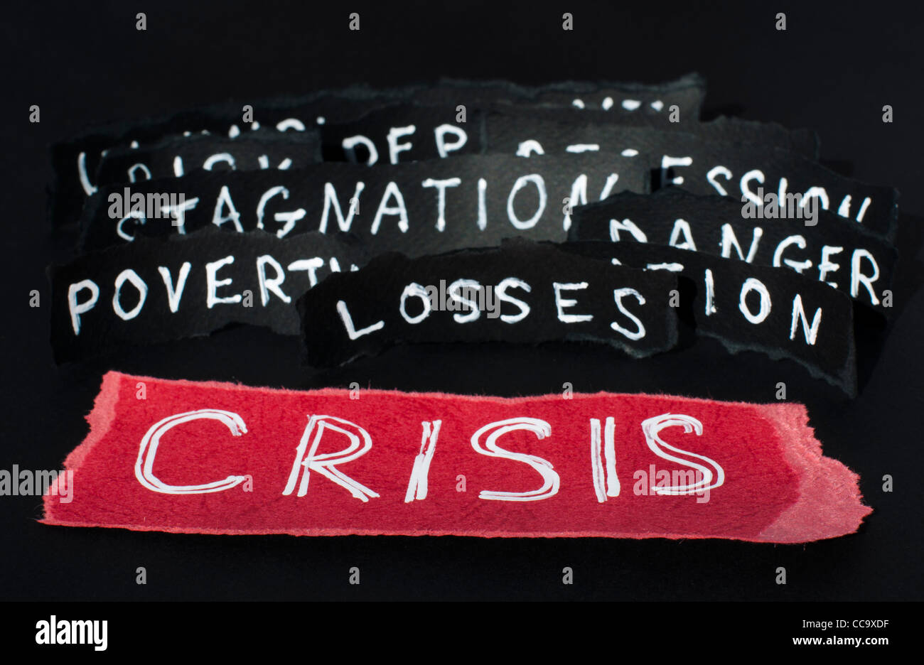 Crisis concept white text on red background. White texts on black