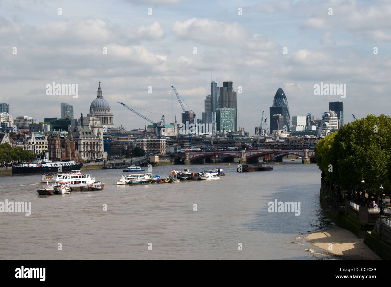 The view from Waterloo Bridge towards St Paul's  Cathedral and the tall buildings in the city of London Stock Photo