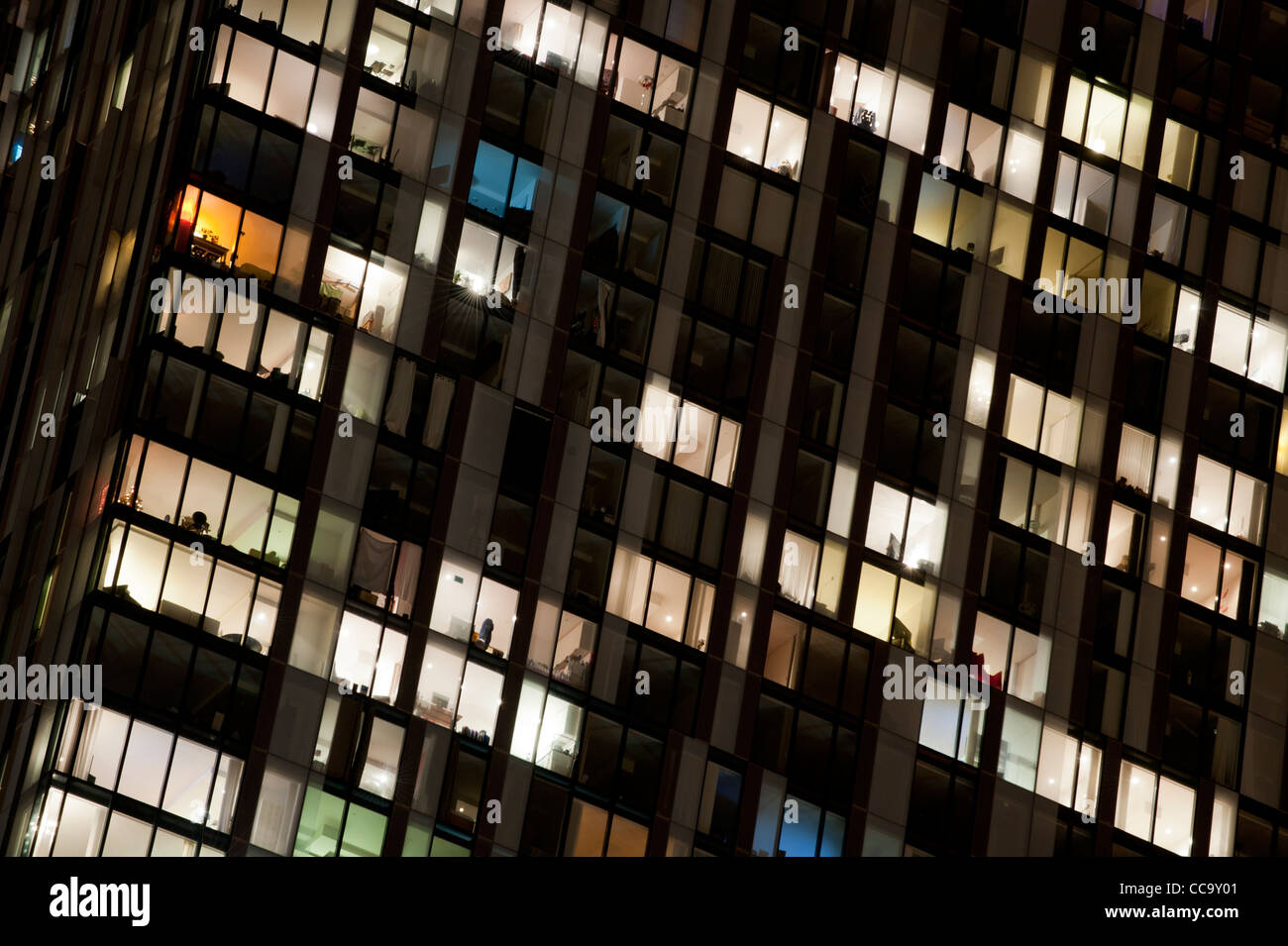 A night time close up of the residential apartments above the Hilton Hotel in Beetham Tower, Manchester, UK. Stock Photo