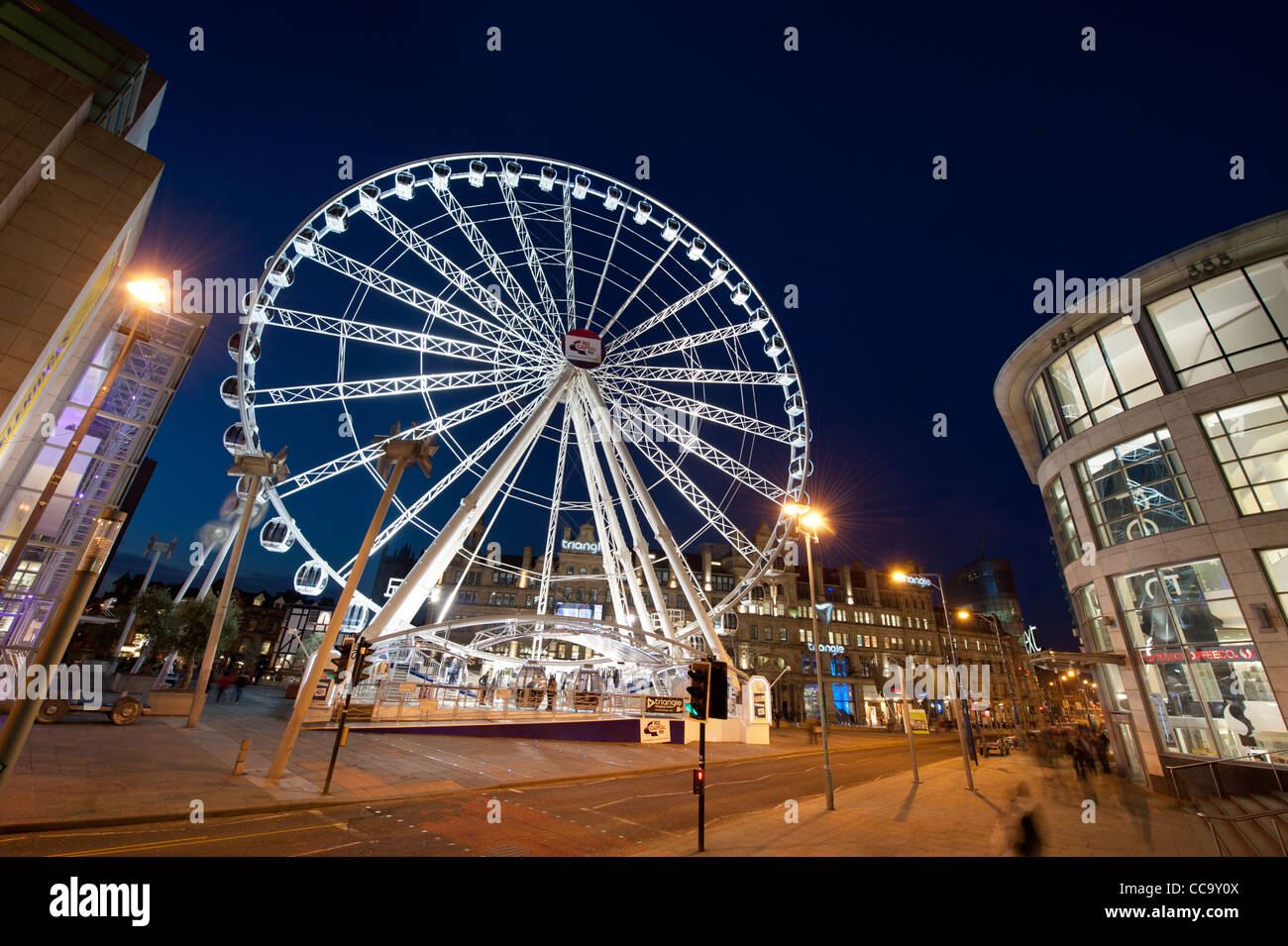 The Wheel of Manchester public ferris wheel in Exchange Square late at night. Stock Photo