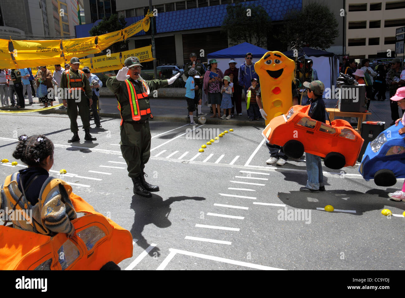 Transport police organise games in street to teach children to respect traffic controls for Pedestrian Day, La Paz, Bolivia Stock Photo
