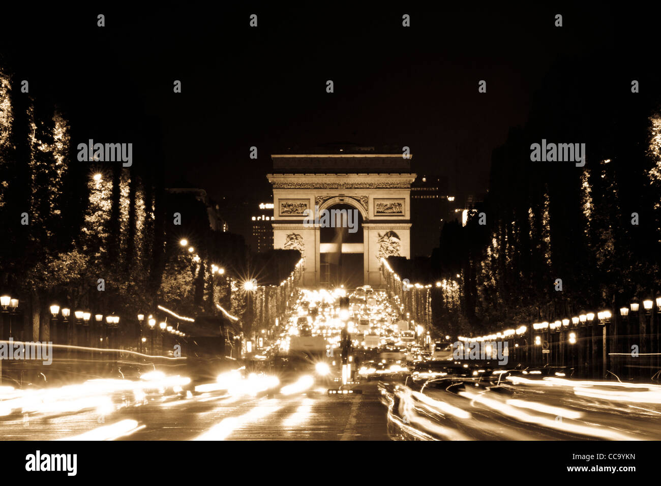 The Arc de Triomphe at night from the Champs Elysee, Paris, France Stock Photo