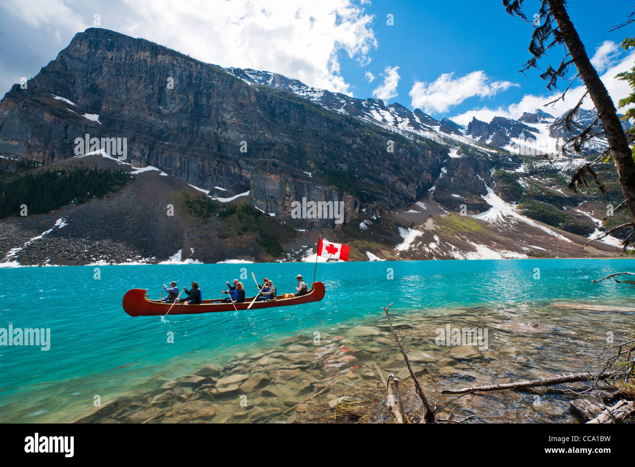 An expedition canoe on a tour of Lake Louise, Alberta, Canada. Stock Photo