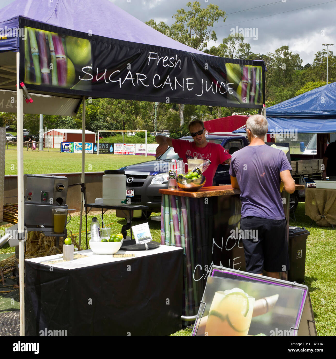 Sugar Cane juice drink stall at country produce market at Yandina