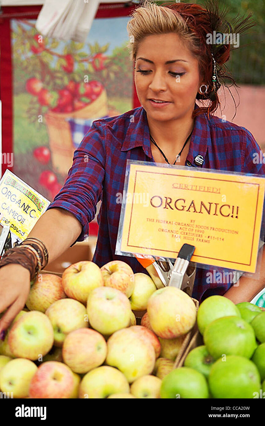 female apple vendor, Farmer's Market, Santa Barbara, California, United States of America Stock Photo