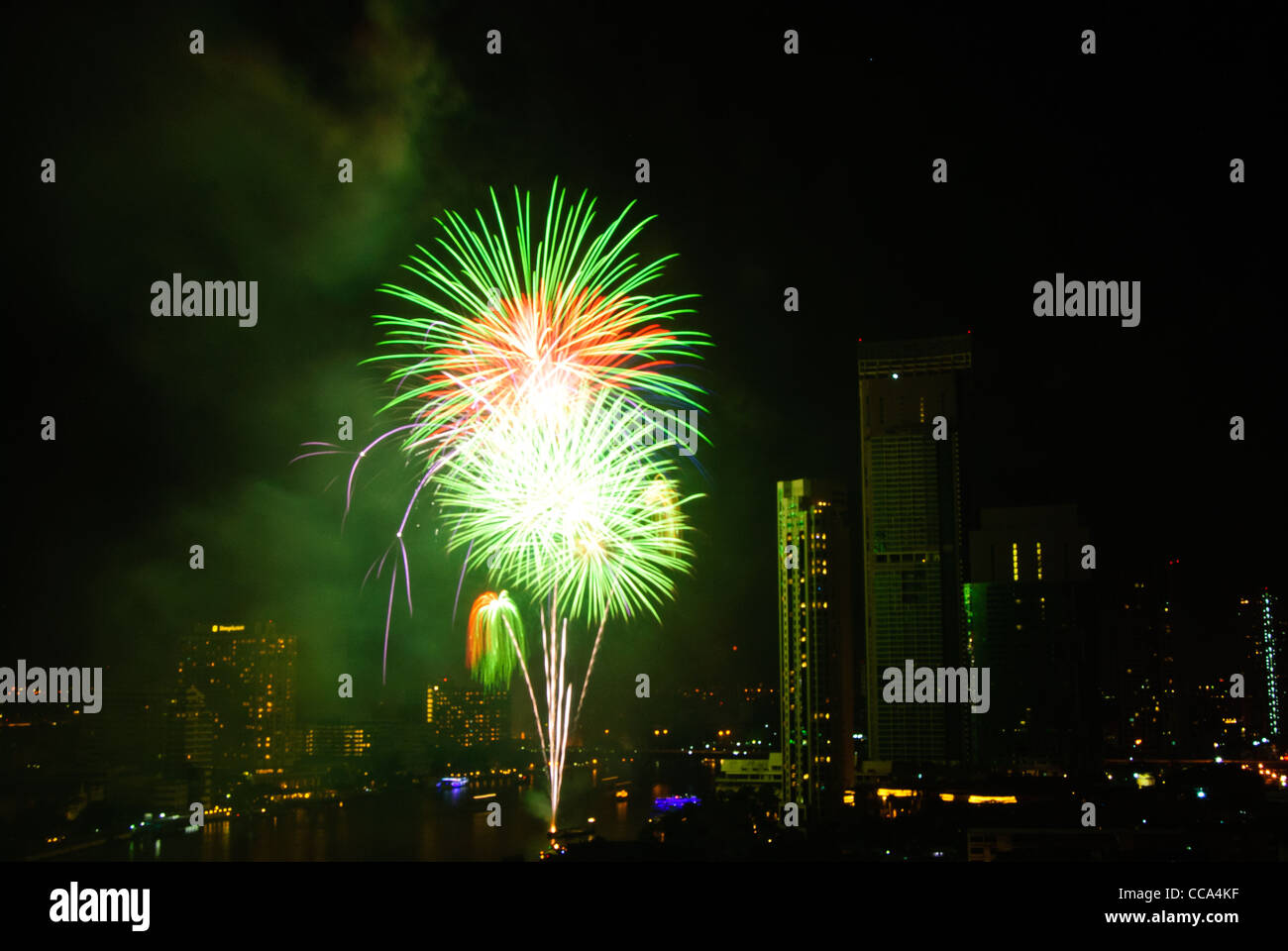 2012 New Year Fireworks over Chao Phraya River in Bangkok Stock Photo