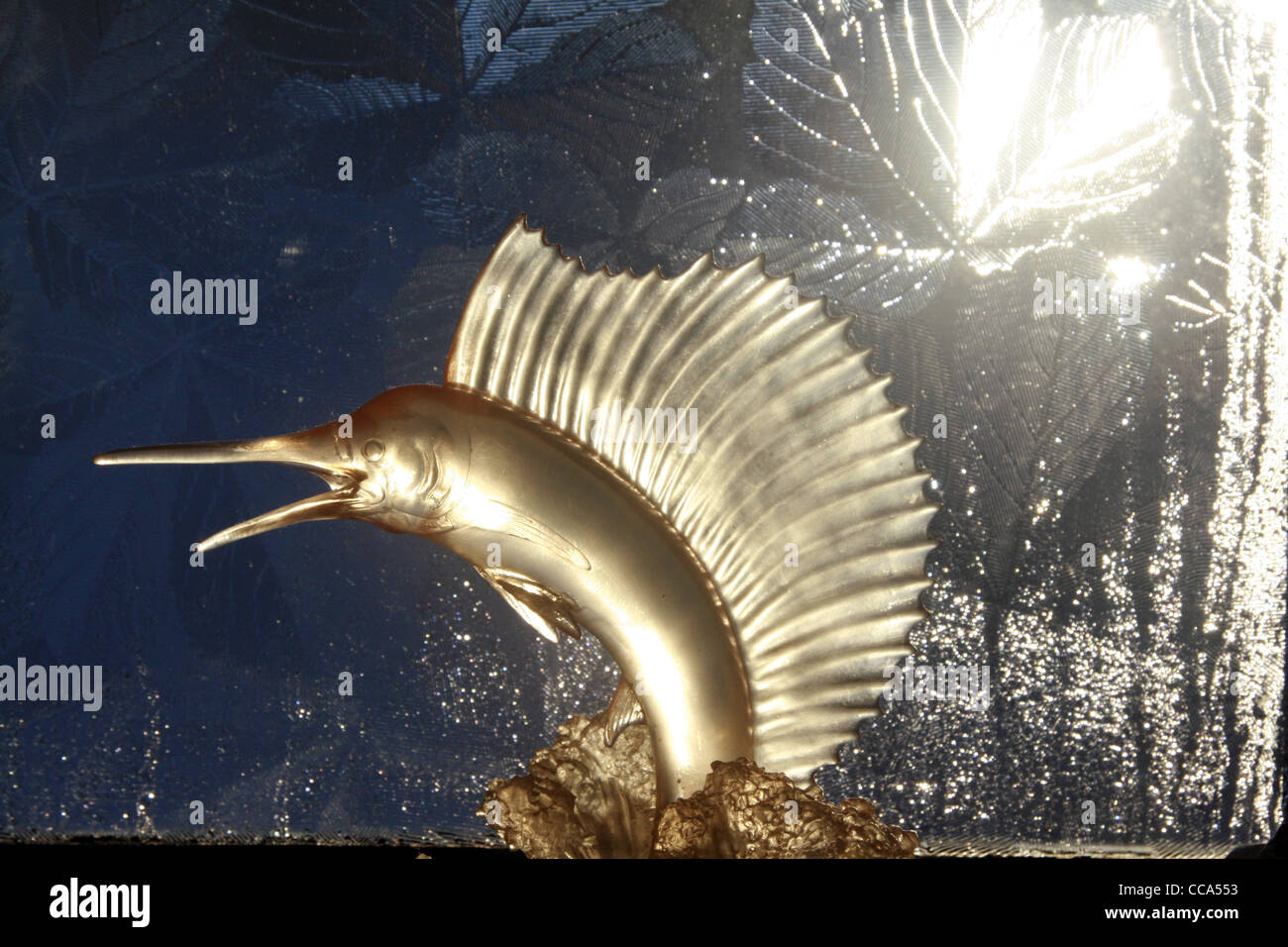 marlin fish ornament by bathroom window Stock Photo Alamy