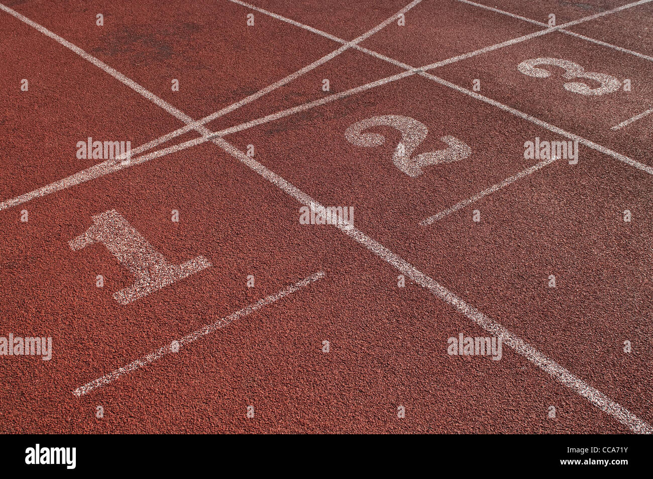 Close up of running track start lines Stock Photo - Alamy