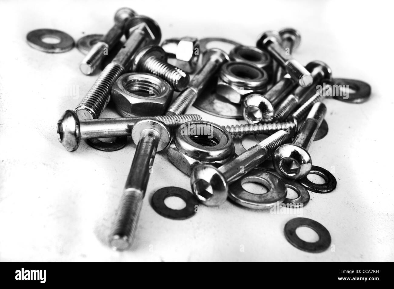 nuts and bolts in a white backgorund. Stock Photo