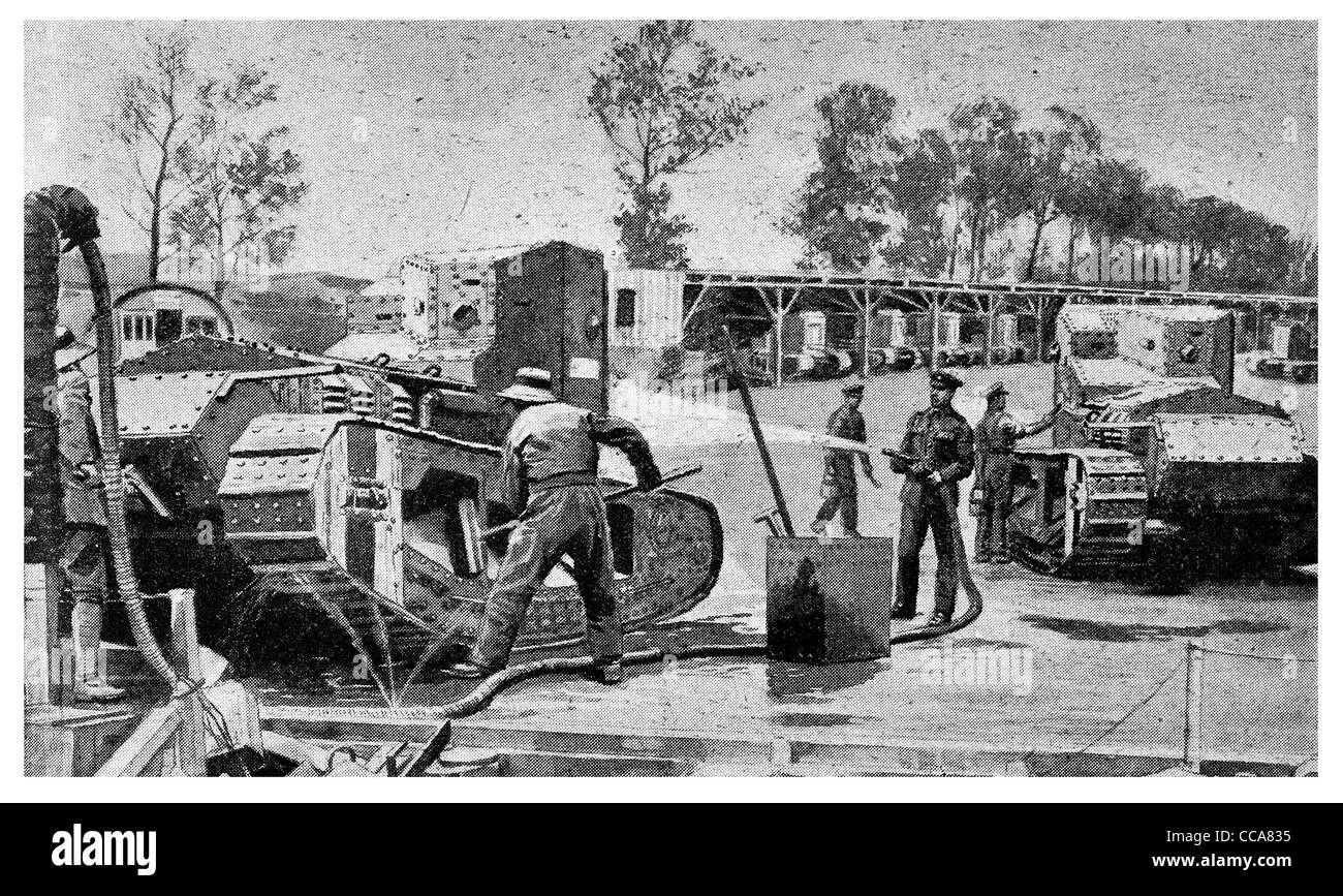 1918 British tank corps corp washing down hosing painting camouflaging battlefield camouflage barrack yard officer engineer Stock Photo
