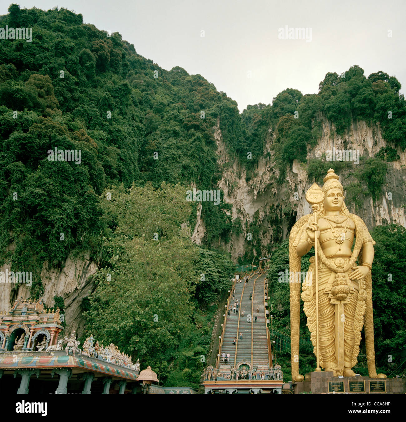 The Hindu Lord Murugan Kartikeya Deity statue at the Batu Caves in Kuala Lumpur in Malaysia in Far East Southeast Asia. Travel Stock Photo