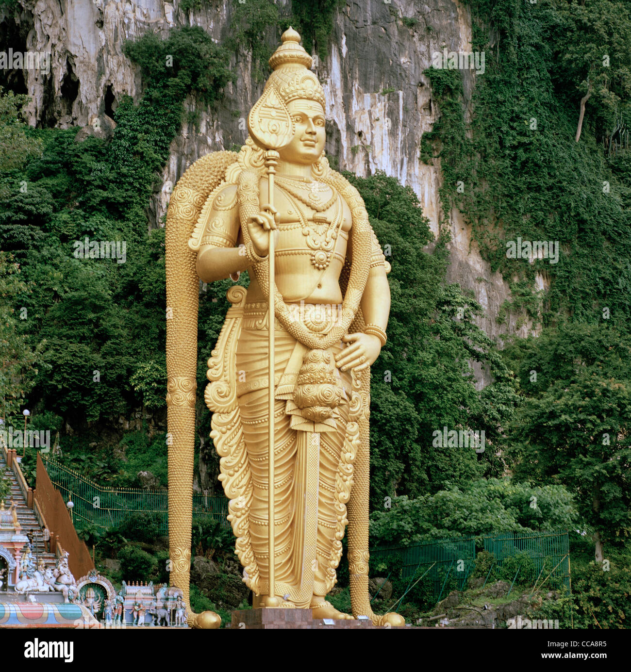 The Hindu Lord Murugan Kartikeya Deity Statue At The Batu Caves In 